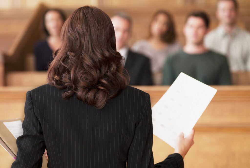 A lawyer speaks to the jury