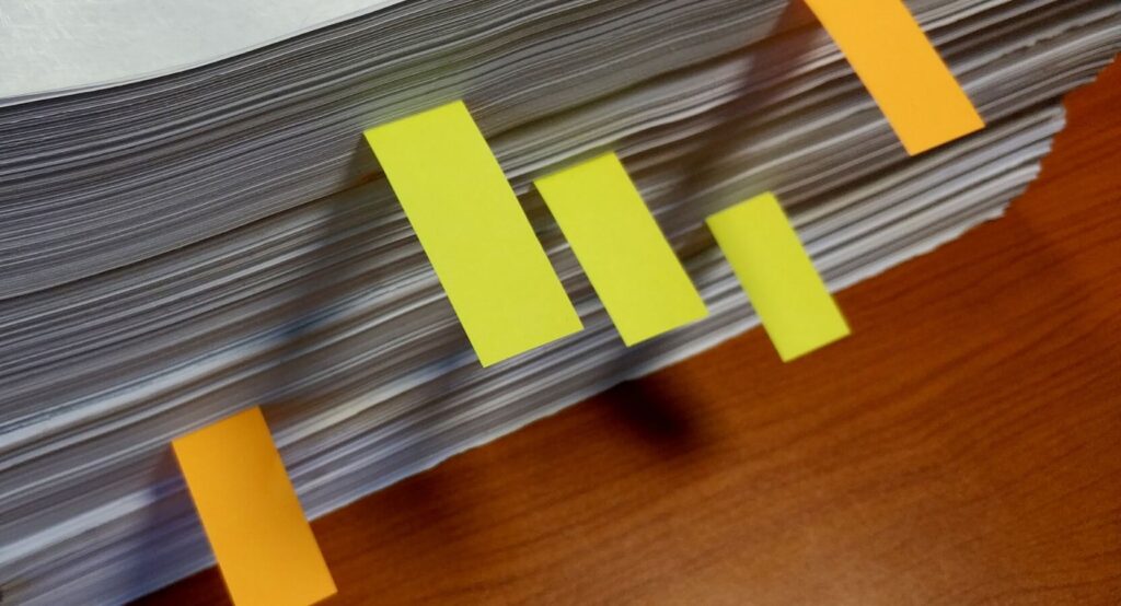 Closeup of a stack of papers with tabs