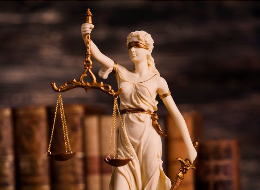 woman holding scales of justice