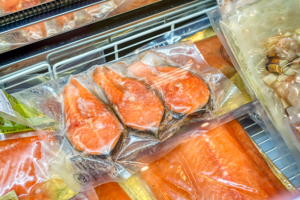 Packaged seafood variety in a shop.