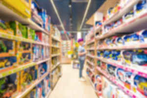 Child shopping in toy aisle of store